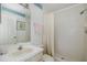 Bathroom featuring a shower with a curtain, neutral walls, and a vanity at 4575 Whitton Way # 1132, New Port Richey, FL 34653
