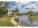 Condos with a scenic view of a canal running through the community at 4575 Whitton Way # 1132, New Port Richey, FL 34653