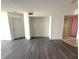 A look at the living room with view of the hallway and front door at 4823 Ebbtide Ln # 105, Port Richey, FL 34668