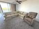 Living room with carpet and couch at 4823 Ebbtide Ln # 105, Port Richey, FL 34668