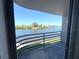 Balcony view overlooking the water and shoreline at 4823 Ebbtide Ln # 105, Port Richey, FL 34668