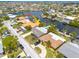 Well-maintained single-story home with a sparkling pool, lush landscaping, and convenient canal access at 4917 Marlin Dr, New Port Richey, FL 34652