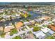 Aerial view of waterfront community with private boat docks and access to the Gulf of Mexico at 4917 Marlin Dr, New Port Richey, FL 34652