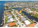 Aerial view of waterfront community showing the canal system and single Gathering homes at 4917 Marlin Dr, New Port Richey, FL 34652