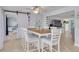 Bright dining room features a ceiling fan and an easy transition to the living area at 4917 Marlin Dr, New Port Richey, FL 34652