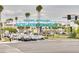 View of the Historic Downtown New Port Richey sign with palm trees and traffic at 4917 Marlin Dr, New Port Richey, FL 34652