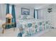 Cozy main bedroom featuring a comfortable bed, soft lighting, and stylish decor at 4917 Marlin Dr, New Port Richey, FL 34652