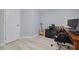 Office space featuring modern computer equipment and hardwood flooring at 4917 Marlin Dr, New Port Richey, FL 34652