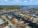 Beautiful aerial view of waterfront homes with boat docks and canal access at 4937 Dory Dr, New Port Richey, FL 34652