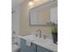 Bathroom featuring vanity, mirror, and fixtures at 4937 Dory Dr, New Port Richey, FL 34652