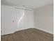 Bedroom featuring a spacious closet and neutral decor, offering ample storage at 4937 Dory Dr, New Port Richey, FL 34652