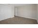 Bedroom with a spacious closet and neutral decor, offering ample storage at 4937 Dory Dr, New Port Richey, FL 34652