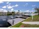 Waterfront property with a private dock and boat lift, offering direct access to the canal at 4937 Dory Dr, New Port Richey, FL 34652