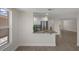 Living room with granite bar top that leads into a kitchen at 4937 Dory Dr, New Port Richey, FL 34652