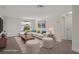Staged living room featuring modern furniture, decor and a comfortable layout at 4937 Dory Dr, New Port Richey, FL 34652