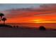 Serene sunset view near the beach, featuring coastal seating and beach access to take in the amazing views of the gulf waters at 4937 Dory Dr, New Port Richey, FL 34652