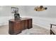 Office with desk, chair, and decoration at 5001 Night Star Trl, Odessa, FL 33556
