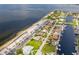 An aerial view of the community along the water with beach access and canals at 5045 Pelican Dr, New Port Richey, FL 34652