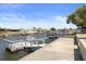 Private dock area with views of the neighborhood waterfront homes along the canal at 5045 Pelican Dr, New Port Richey, FL 34652