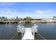 View down the canal from the private dock; lovely neighborhood with well-kept homes at 5045 Pelican Dr, New Port Richey, FL 34652