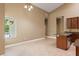 View of kitchen island with dining area featuring ample natural light and tile floors at 5487 Valley View Dr, Brooksville, FL 34601