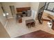 A bright, open kitchen with stainless steel appliances, tile floors, and a center island at 5487 Valley View Dr, Brooksville, FL 34601