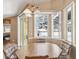 Breakfast nook with natural light coming through the windows by the lanai at 6028 Dorset Rd, Spring Hill, FL 34608