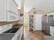 An open kitchen features stainless steel appliances and tons of pantry storage at 6028 Dorset Rd, Spring Hill, FL 34608