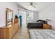 A light and airy main bedroom featuring an abundance of floor space and natural light at 6028 Dorset Rd, Spring Hill, FL 34608