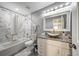 Bathroom featuring modern tiling, granite countertops, and a vessel sink at 6222 Cherry Blossom Trl, Gibsonton, FL 33534