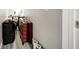 Hallway filled with suitcases and storage, with hard flooring at 6222 Cherry Blossom Trl, Gibsonton, FL 33534