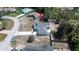 Aerial shot of the house shows the property's layout, driveway, and backyard at 6309 Covewood Dr, Spring Hill, FL 34609