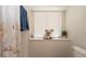Cozy bathroom with natural light and modern fixtures for a clean aesthetic at 6309 Covewood Dr, Spring Hill, FL 34609