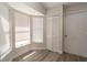 Bright bedroom features plenty of natural light with multiple windows and closet at 6309 Covewood Dr, Spring Hill, FL 34609