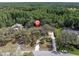 Aerial view of property surrounded by lush trees at 6454 Summerfield Loop, Trinity, FL 34655