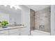 Stylish bathroom with shower-tub and modern vanity at 6454 Summerfield Loop, Trinity, FL 34655