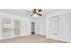 Spacious bedroom features closet and french doors at 6454 Summerfield Loop, Trinity, FL 34655