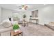 Comfortable living room featuring neutral tones, plush seating, and modern accents at 6454 Summerfield Loop, Trinity, FL 34655