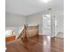 Inviting loft space with wood floors, staircase and natural light at 6454 Summerfield Loop, Trinity, FL 34655