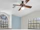 Stylish main bedroom featuring neutral paint, vaulted ceilings, and ample natural light at 6454 Summerfield Loop, Trinity, FL 34655
