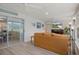 Bright sunroom with sliding glass doors leading to the outdoors at 7175 Bottle Brush Dr, Spring Hill, FL 34606