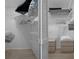 Well-organized walk-in closet with white wire shelving and ample storage space at 7175 Bottle Brush Dr, Spring Hill, FL 34606