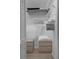 Organized walk-in closet with white wire shelving and ample storage space at 7175 Bottle Brush Dr, Spring Hill, FL 34606