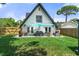 Backyard featuring patio area with dining set and outdoor furniture at 7422 New York Ave, Hudson, FL 34667