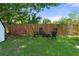 Backyard with a fire pit and swing at 7422 New York Ave, Hudson, FL 34667