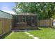 Backyard featuring a gazebo with a hot tub inside at 7422 New York Ave, Hudson, FL 34667