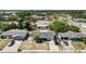 Aerial view of the property and surrounding neighborhood showing street access and nearby homes at 7535 Christina Ln, Port Richey, FL 34668