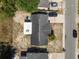Bird's eye view of home's roof and spacious yard, offering privacy and outdoor potential in a nice neighborhood at 7535 Christina Ln, Port Richey, FL 34668