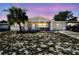 Charming single-story home with a well-maintained yard and inviting curb appeal in a quiet neighborhood at 7535 Christina Ln, Port Richey, FL 34668