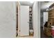 Walk-in pantry with shelving at 7535 Christina Ln, Port Richey, FL 34668